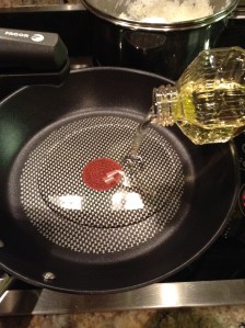 Add Canola Oil in Frying Pan